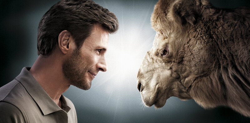 Man and Camel Facing