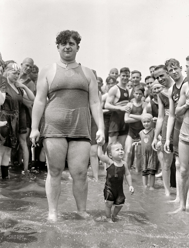 Man and child at beach