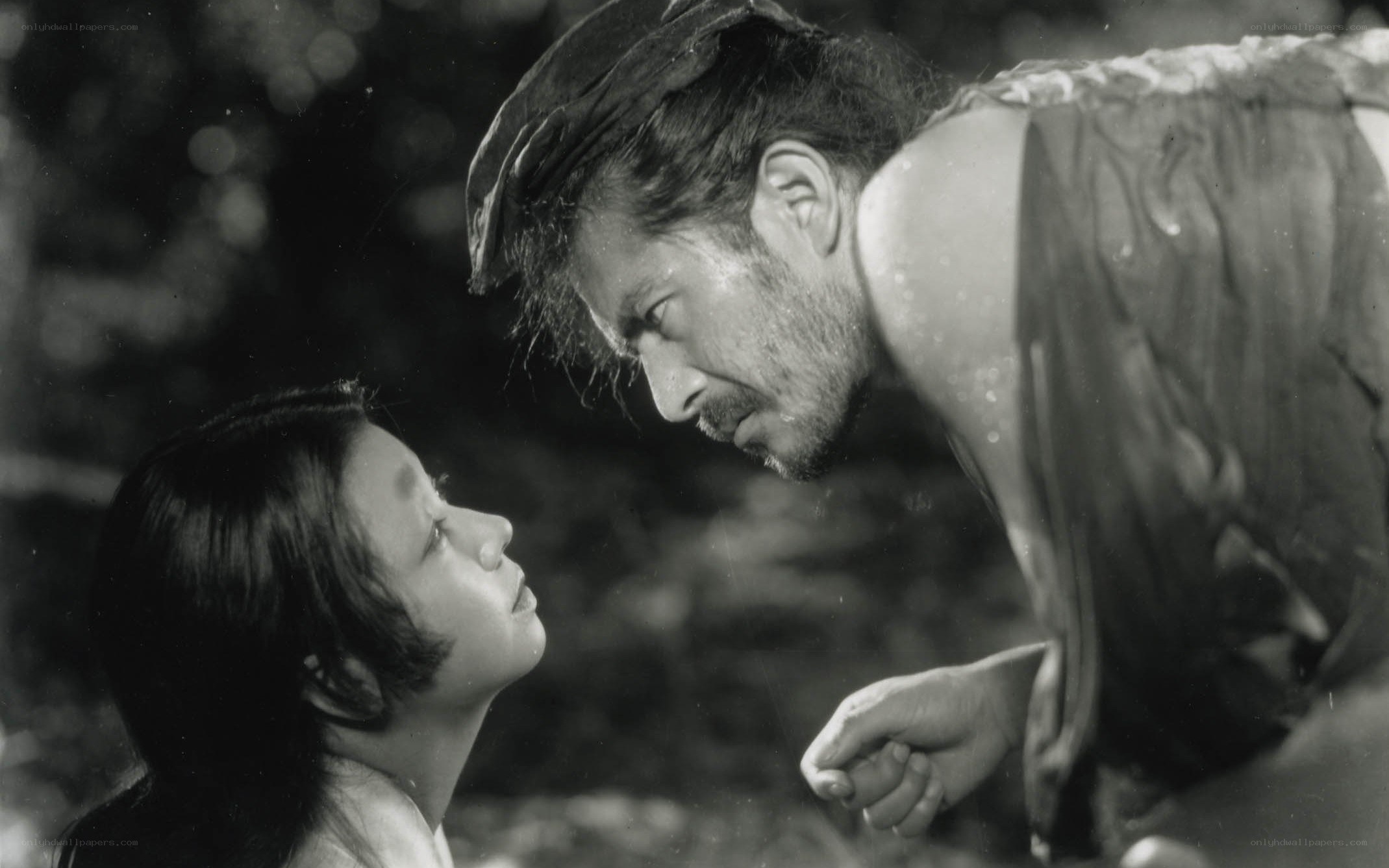 man and child in forest