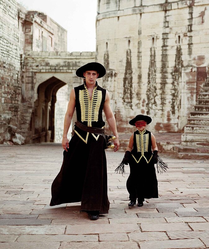 Man and child in historical costumes