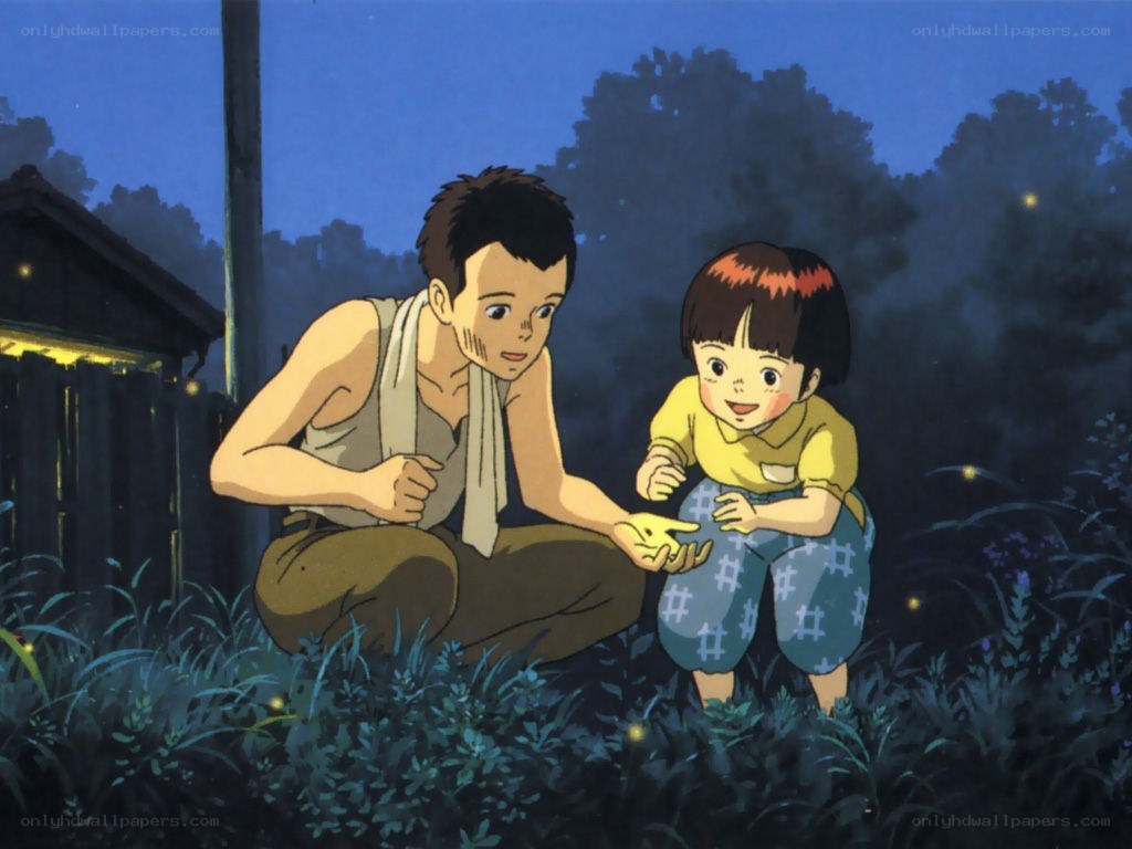 man and child watching fireflies