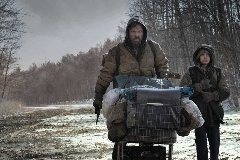 man and child with shopping cart