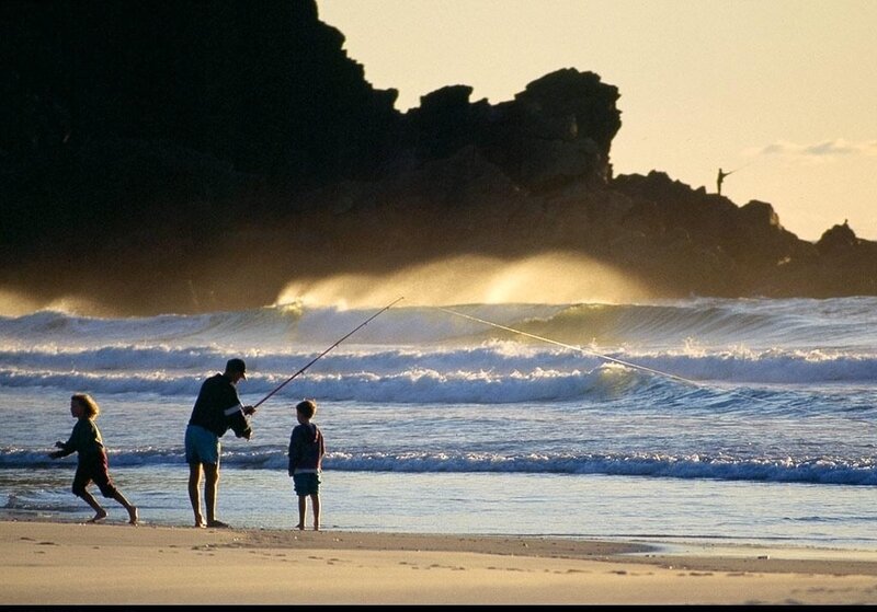 Man and Children Fishing