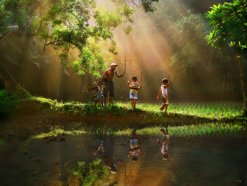 Man and Children in Forest