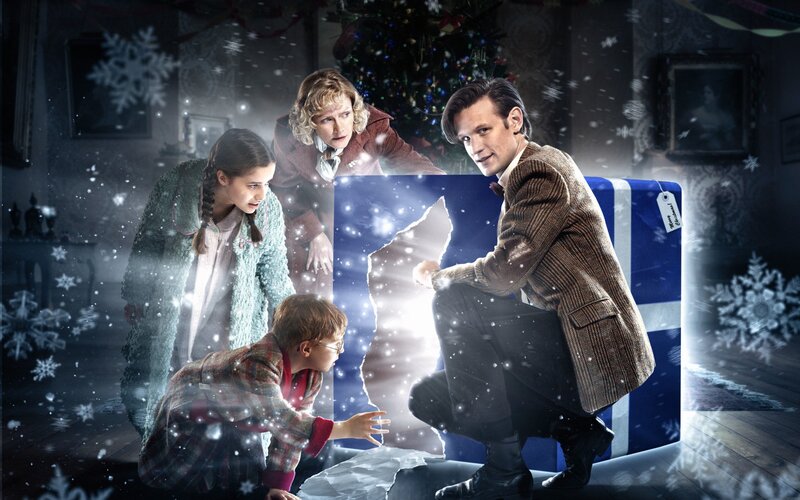 Man and Children with Gift