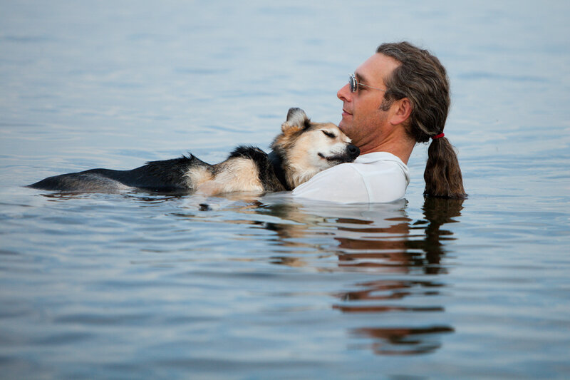 Man and Dog in Water