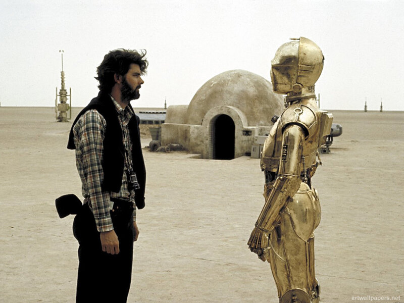 Man and droid on a desert planet