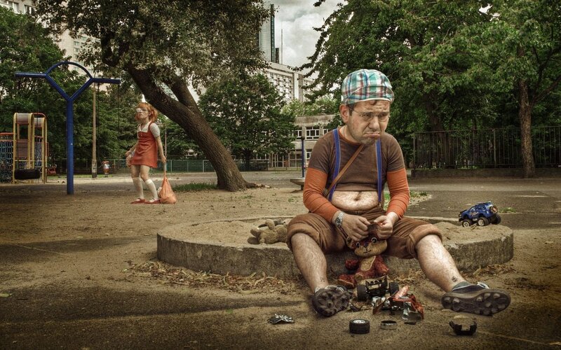 Man and girl in playground