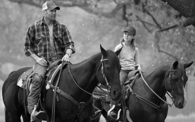 Man and Girl on Horses — Black