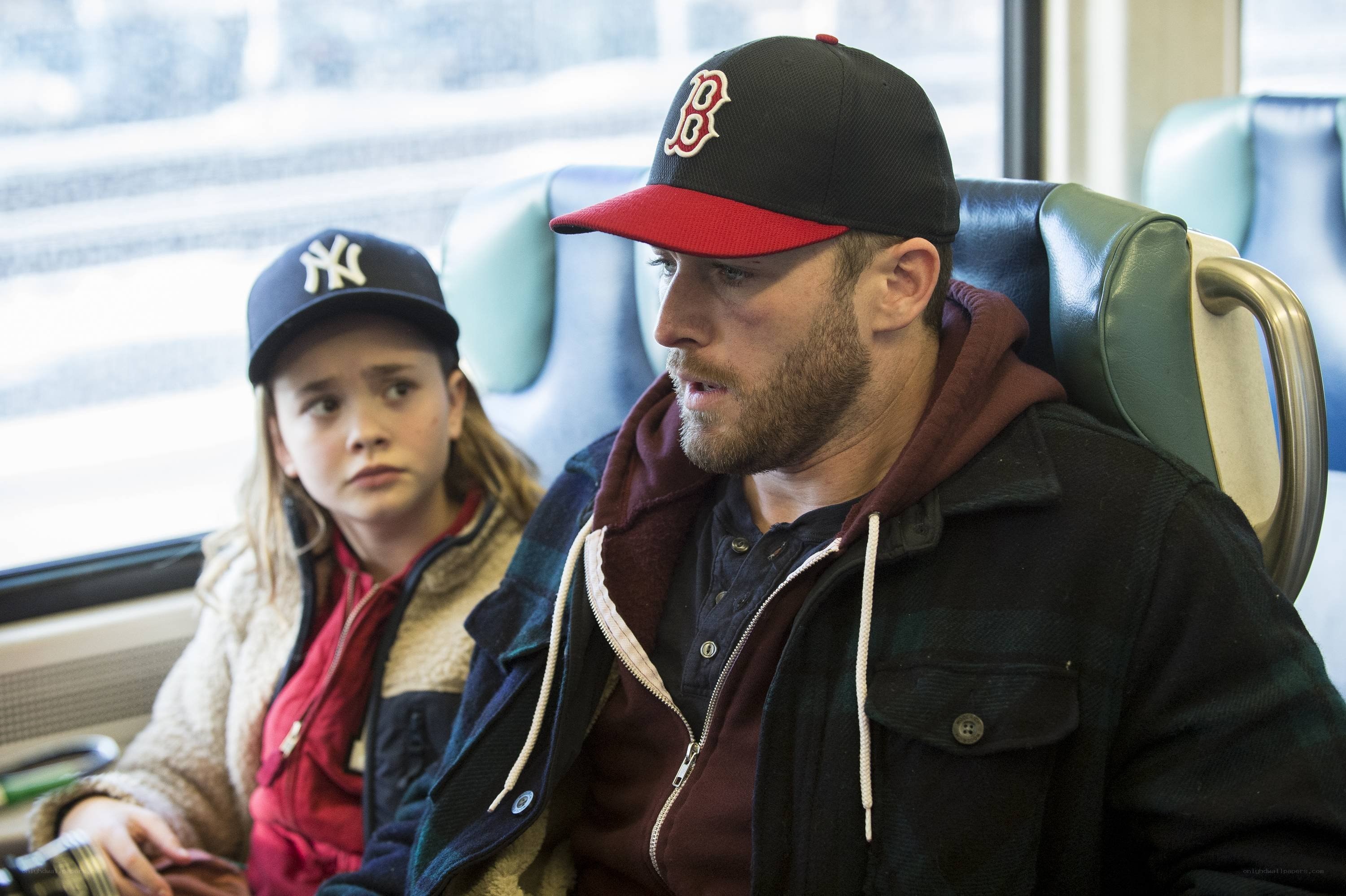 Man and girl on train