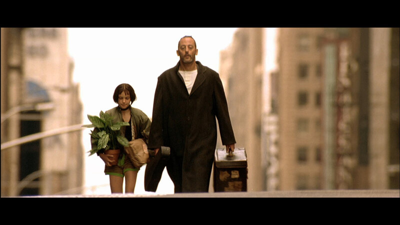 man and girl walking in city