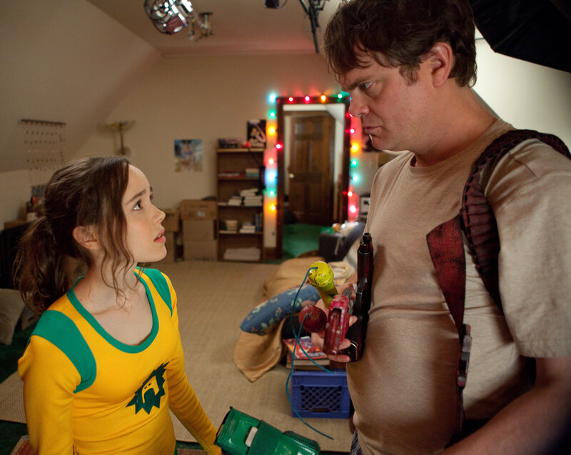 Man and girl with toy guns