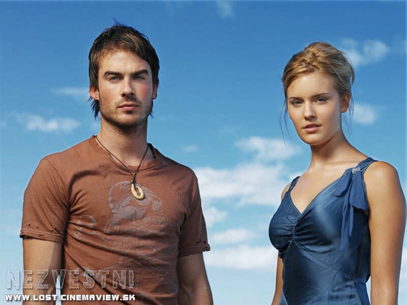 man and woman against blue sky
