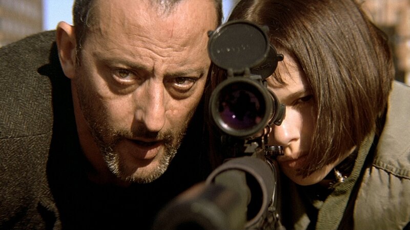 man and woman aiming rifle