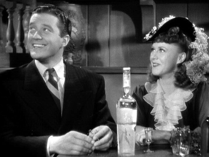 Man and woman at bar