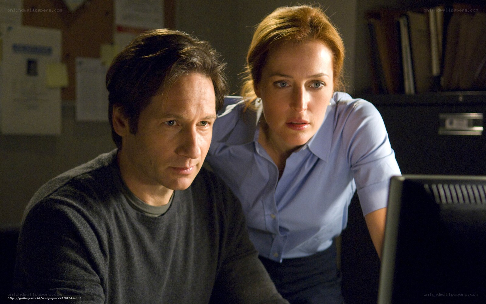 man and woman at computer