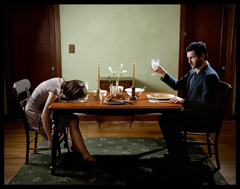 Man and Woman at Dinner Table — Brown, Dramatic