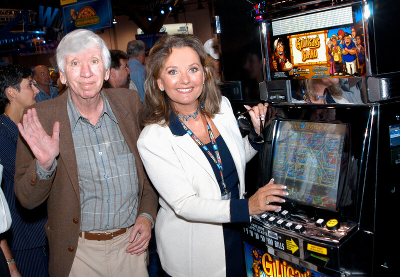 Man and Woman at Slot Machine