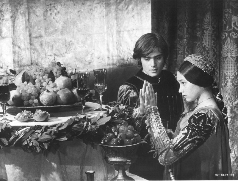 Man and Woman at Table — Black, Dramatic, Photograph