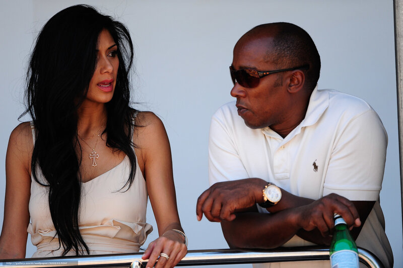 Man and woman conversing at event