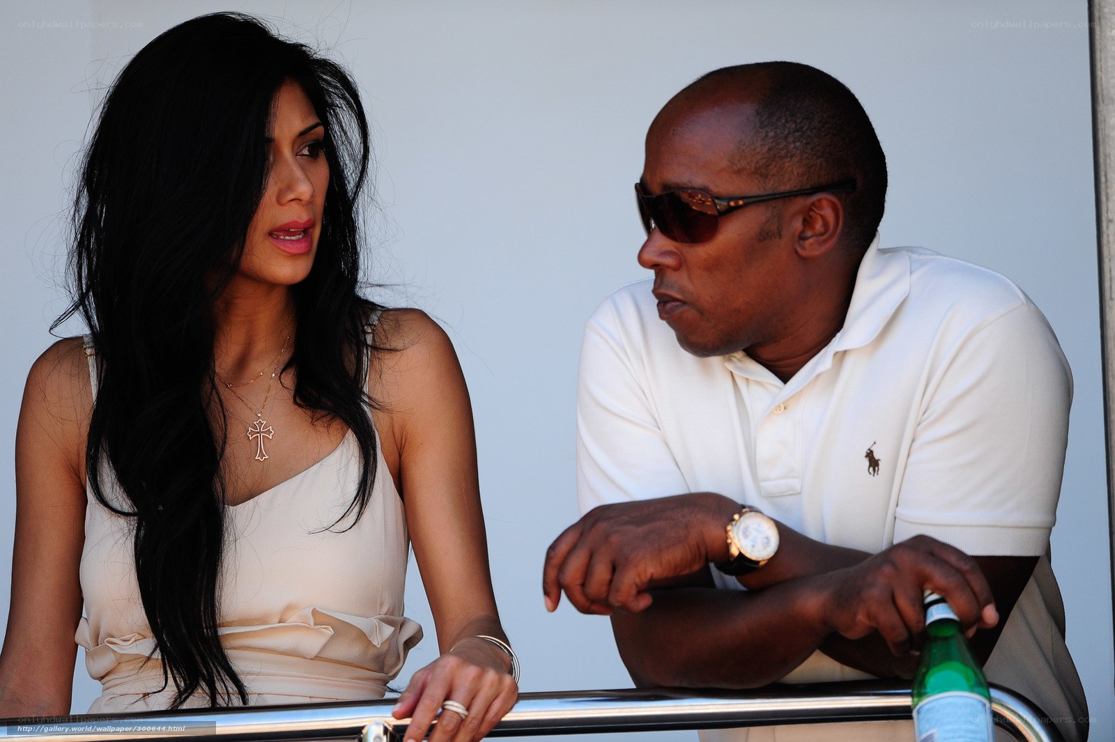 Man and woman conversing at event