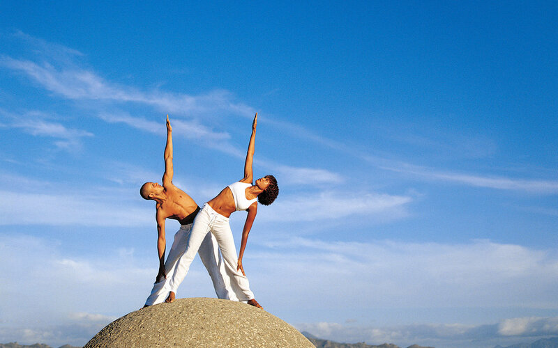 Man and Woman Doing Yoga