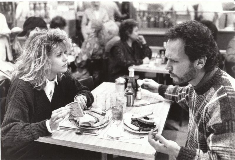 Man and woman eating at a diner