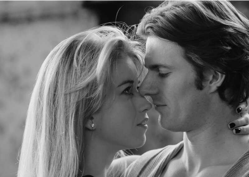 Man and Woman Embracing — Black, Intimate, Photograph, Earring, Hair