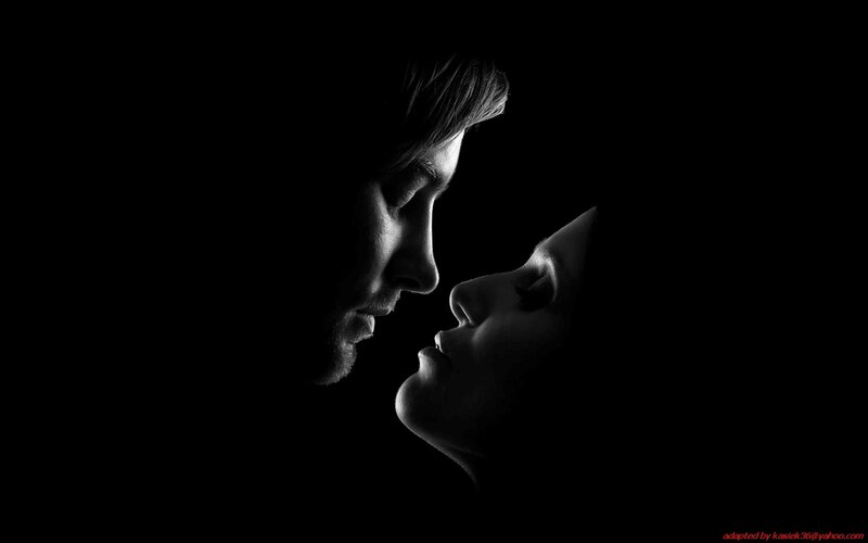 Man and Woman Facing Each Other — Black