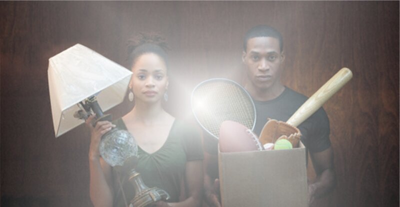 Man and Woman Holding Items