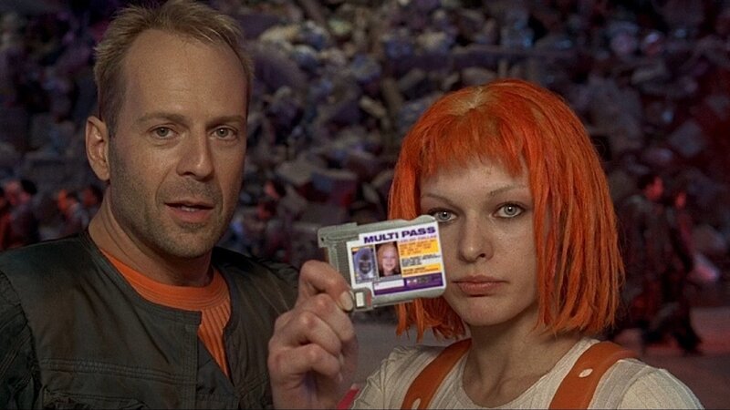 Man and woman holding pass