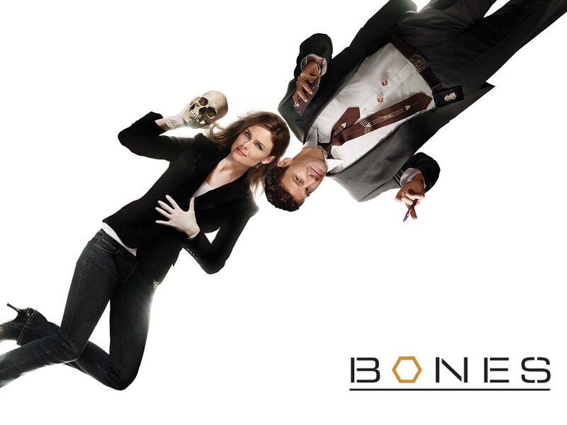 Man and Woman Holding Skull — White