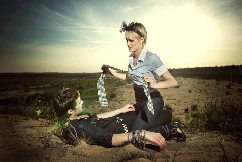 Man and woman in a desert scene