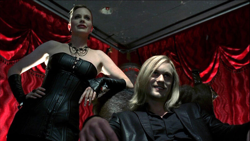 man and woman in black attire