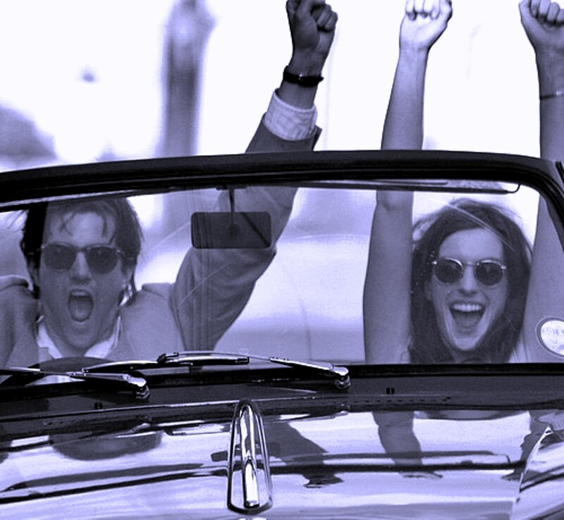Man and Woman in Car — Blue, Joyful, Photograph