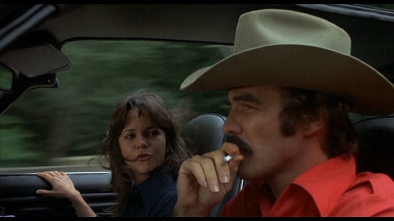 Man and Woman in Car — Red, Dramatic