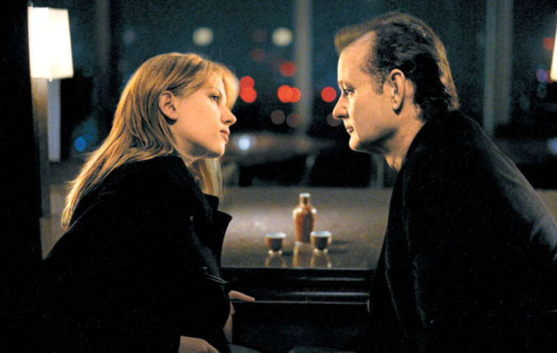 man and woman in conversation
