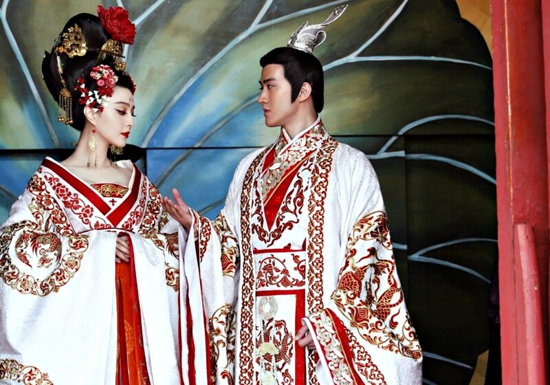 Man and Woman in Costumes — White, Dramatic