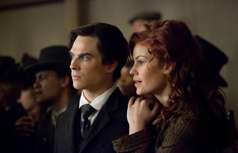 Man and Woman in Crowd — Brown