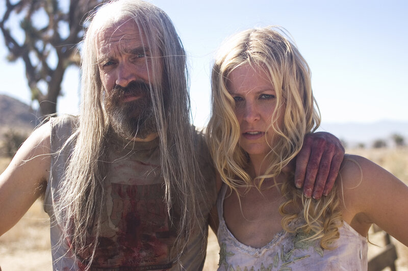 Man and woman in desert scene