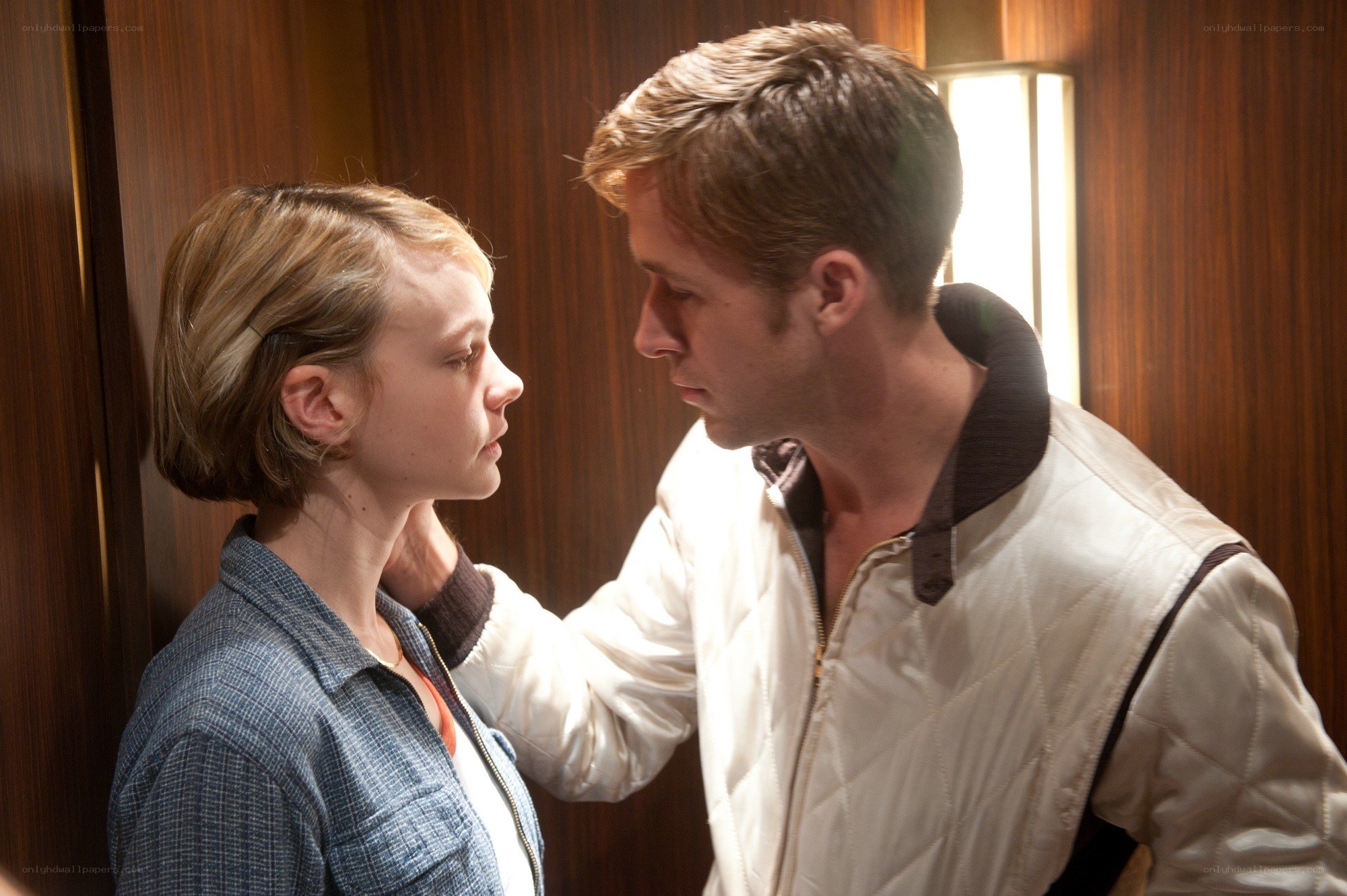man and woman in elevator