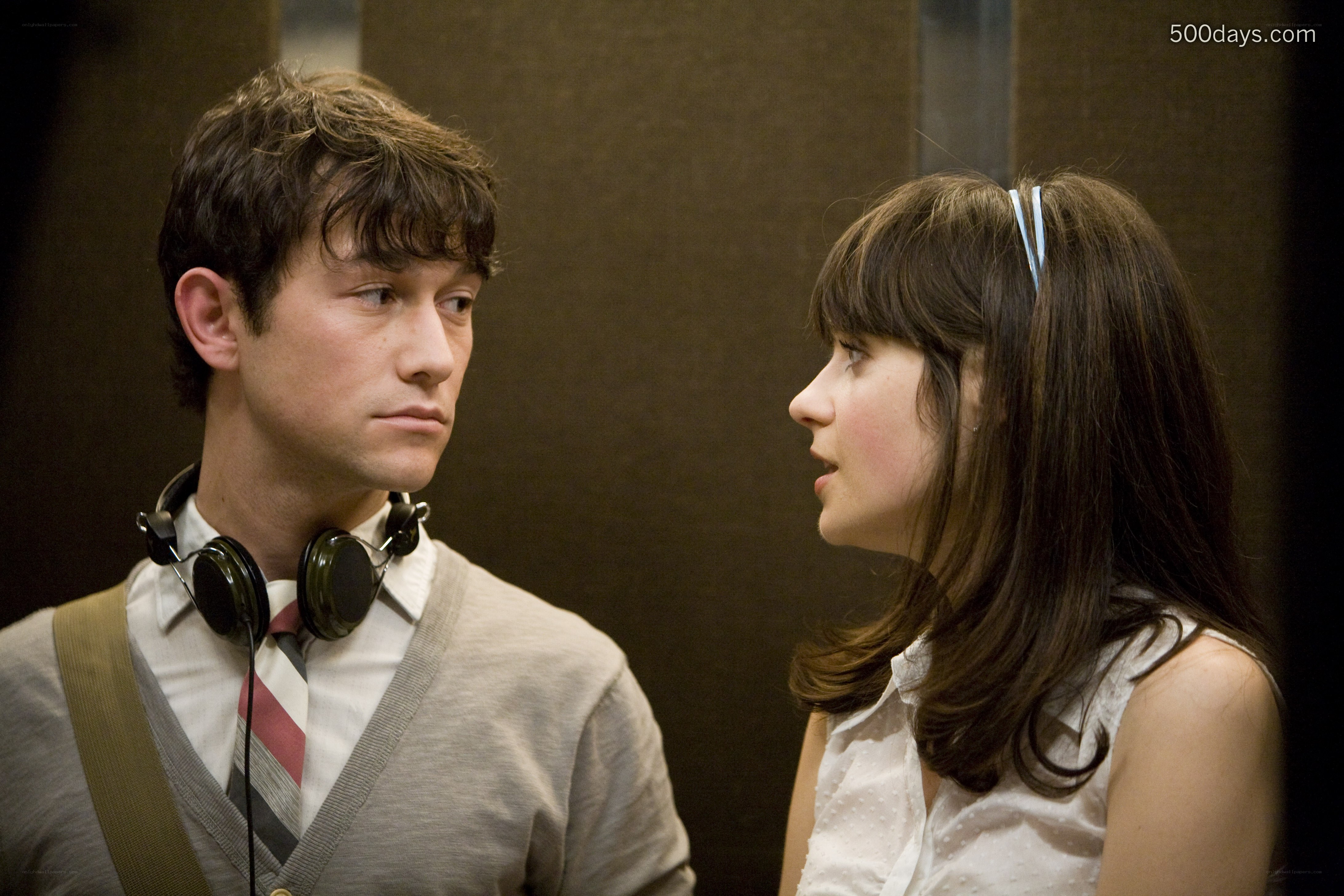 man and woman in elevator