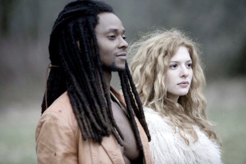 Man and Woman in Forest — Brown, Serious