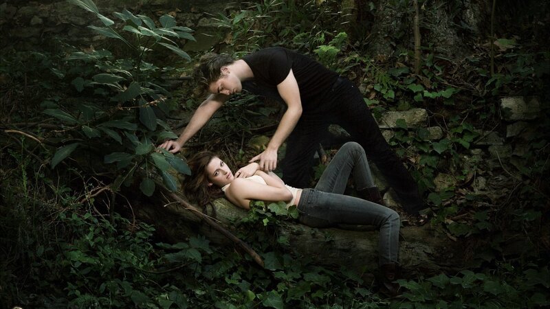 Man and Woman in Forest — Green, Dramatic, Photograph