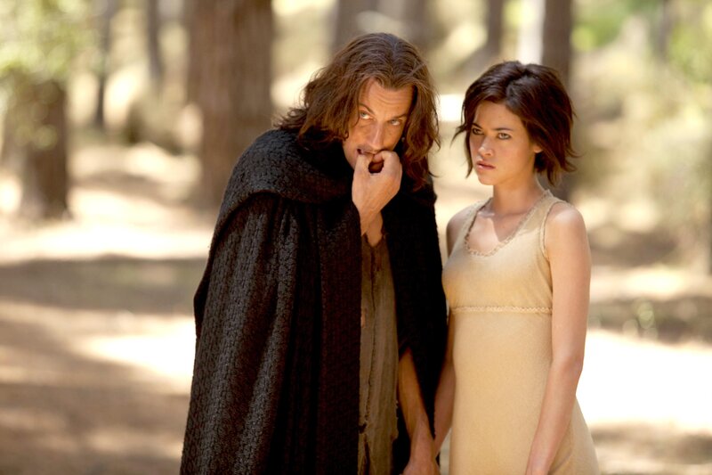 Man and woman in forest scene