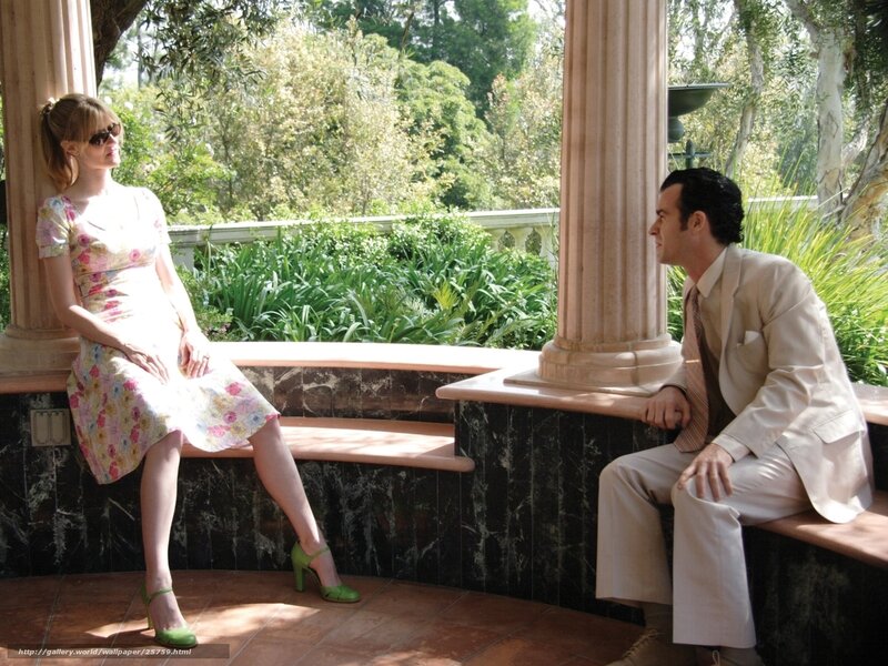 Man and woman in garden conversation