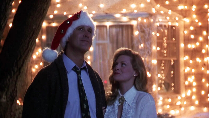 Man and Woman in Holiday Lights