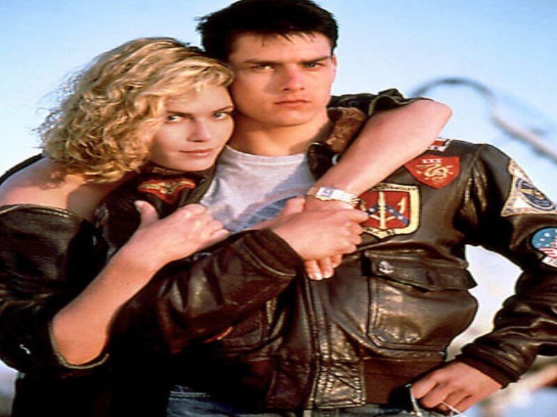 Man and Woman in Leather Jackets — Brown