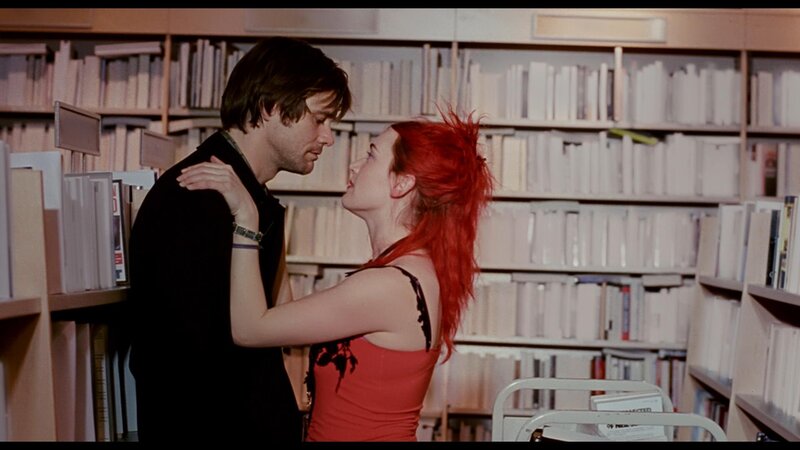Man and Woman in Library — Red