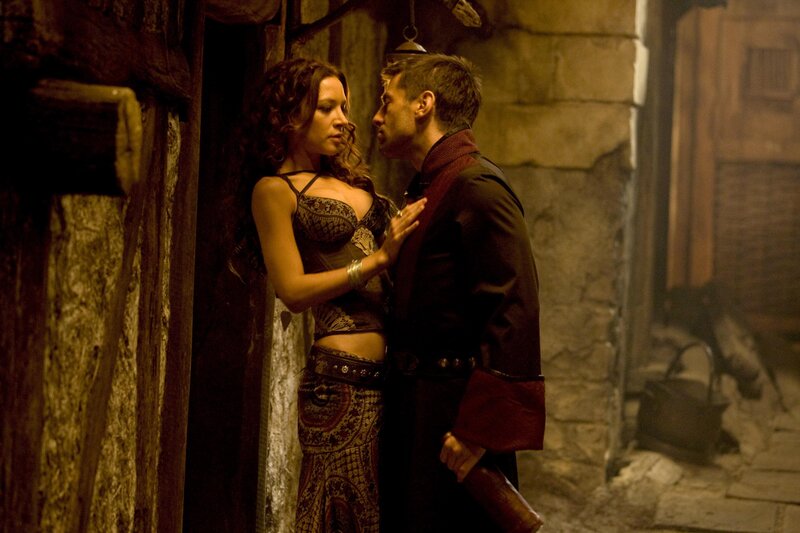 man and woman in medieval setting